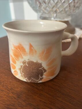 Handmade Pottery Cream Ceramic Mug with Orange Sunflower Motif